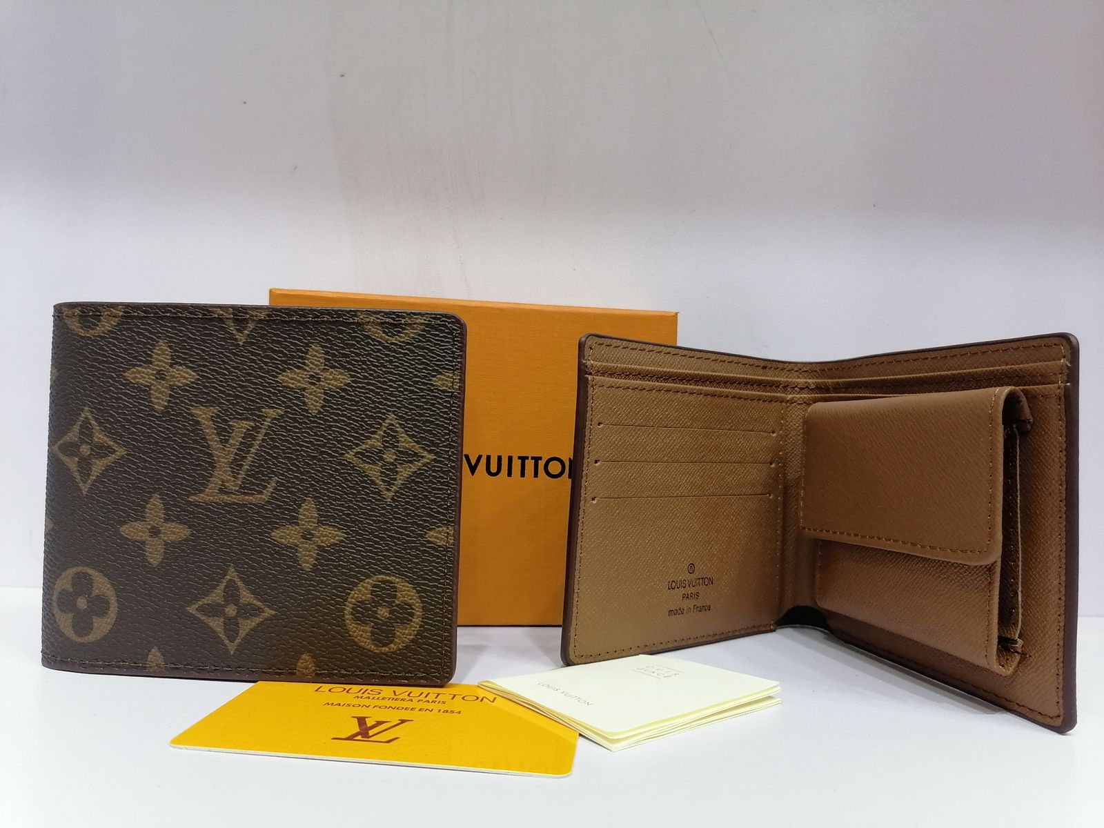 Louis Vuitton Brown Flower Bifold Wallet
