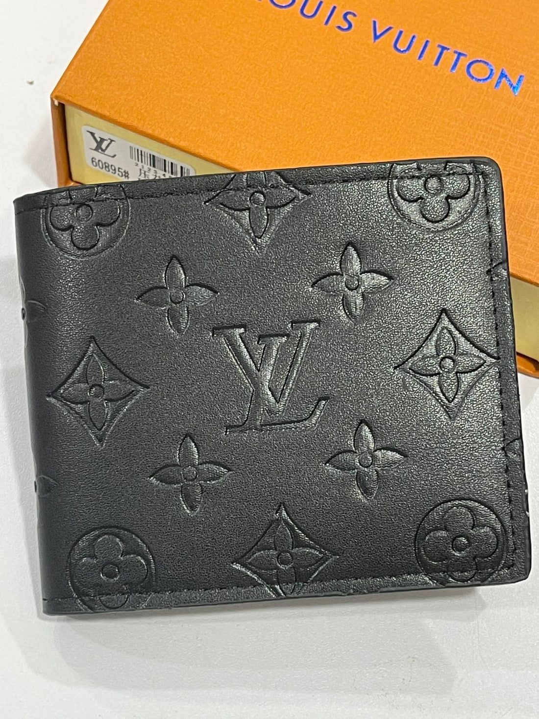 Louis Vuitton Embossed Bifold wallets