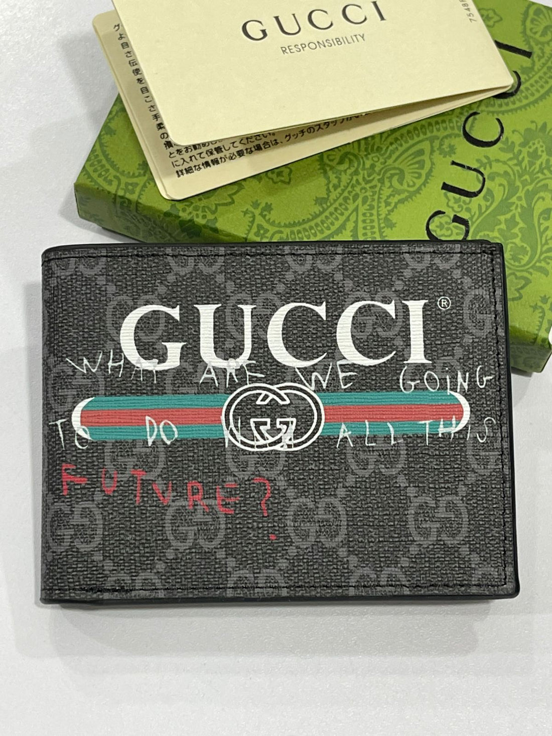 Gucci Bi-fold Wallets