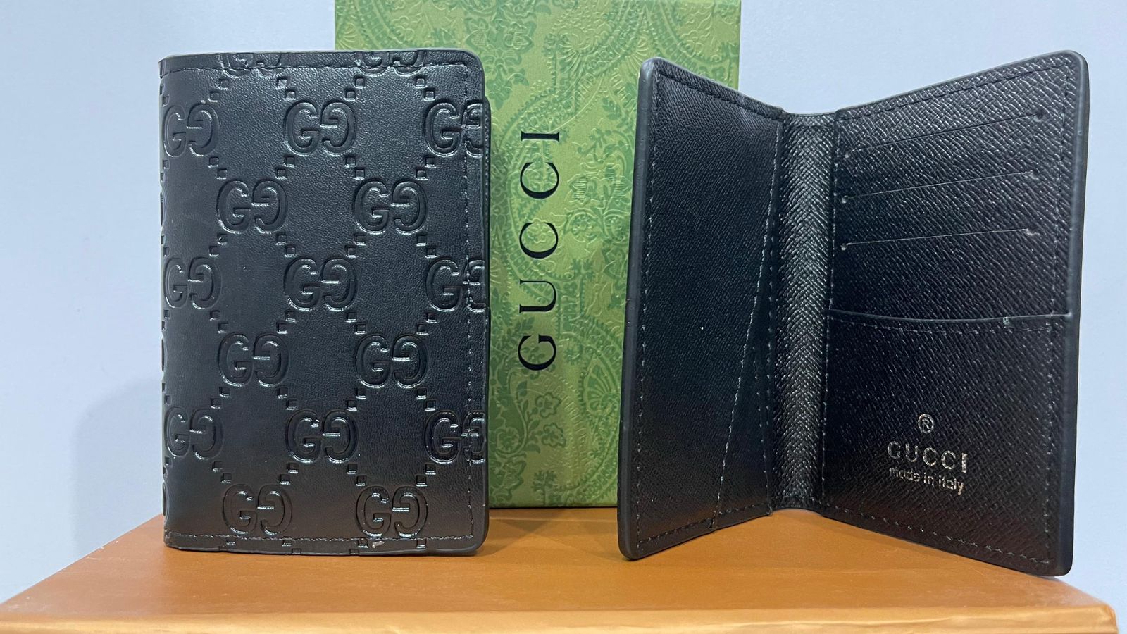 Gucci Embossed Leather Bi-fold Wallet