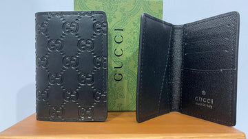 Gucci Embossed Leather Bi-fold Wallet